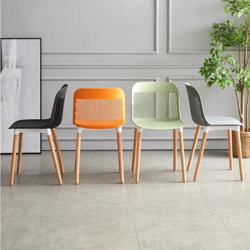 Прост и универсален стол за хранене дебели пластмасови скандинавските столове Домакински удобен кухи стол с облегалка на Стол за почивка . ' - ' . 0